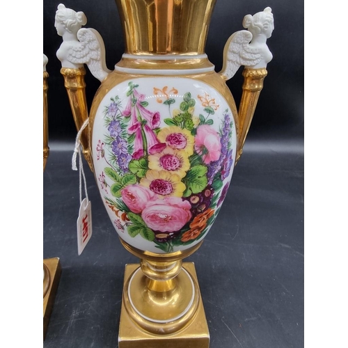 1453 - A pair of 19th century Continental porcelain twin handled vases, 29.5cm high, (s.d. to one).... 