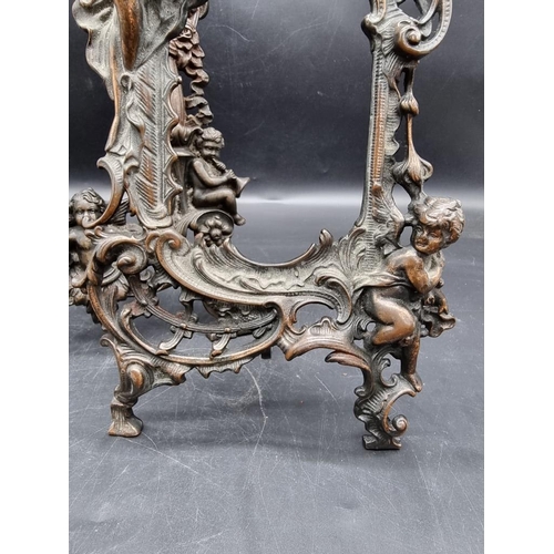 1457 - Two cast iron easel back photograph frames, largest 34.5cm high.