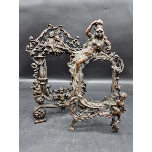 1457 - Two cast iron easel back photograph frames, largest 34.5cm high.