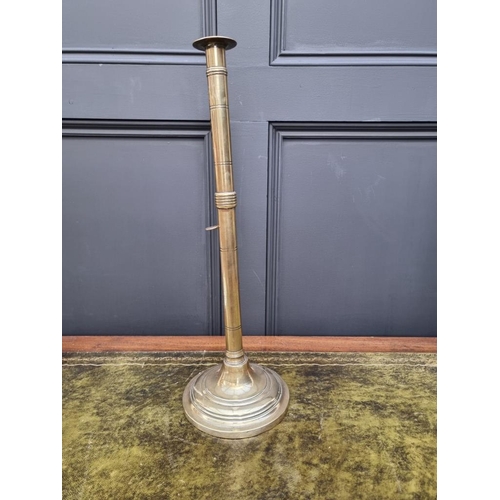 1458 - Two similar large 19th century brass ejecting candlestick, largest 50cm high, (one s.d.). (2)... 