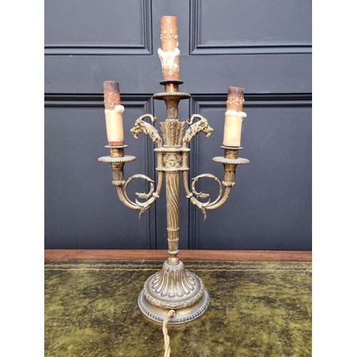 1469 - An antique gilt brass twin branch table lamp, moulded with rams heads, height excluding fittings 42c... 