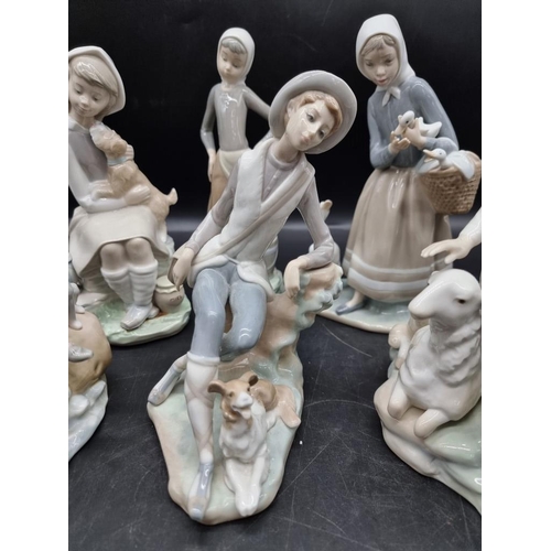 1475 - Six Lladro figures, largest 24cm high. 