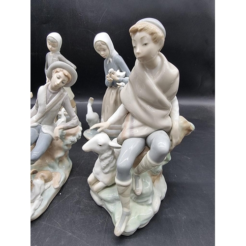 1475 - Six Lladro figures, largest 24cm high. 