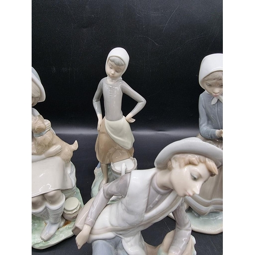 1475 - Six Lladro figures, largest 24cm high. 