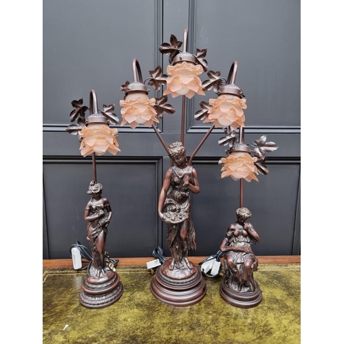 1483 - Three bronzed resin figural table lamps, largest 81cm high. 