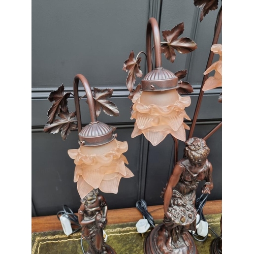 1483 - Three bronzed resin figural table lamps, largest 81cm high. 