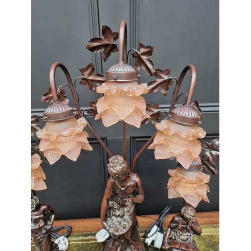 1483 - Three bronzed resin figural table lamps, largest 81cm high. 