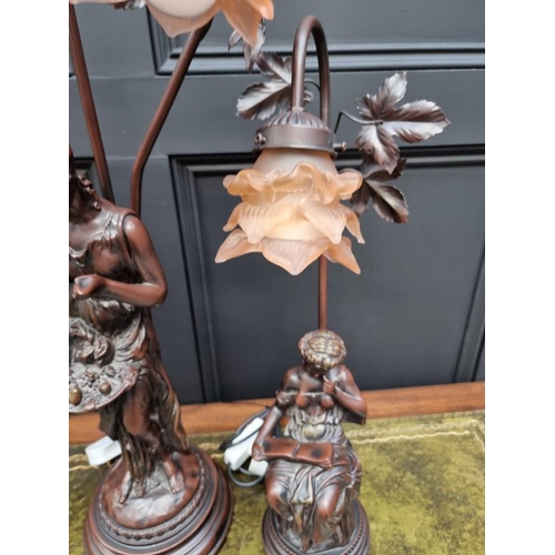 1483 - Three bronzed resin figural table lamps, largest 81cm high. 