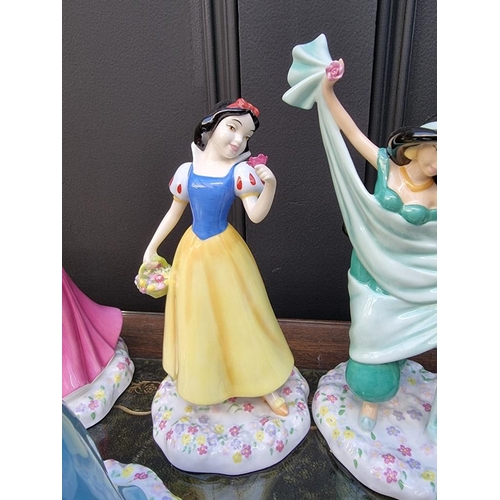 1484 - Six Royal Doulton 'Disney Princesses'. 