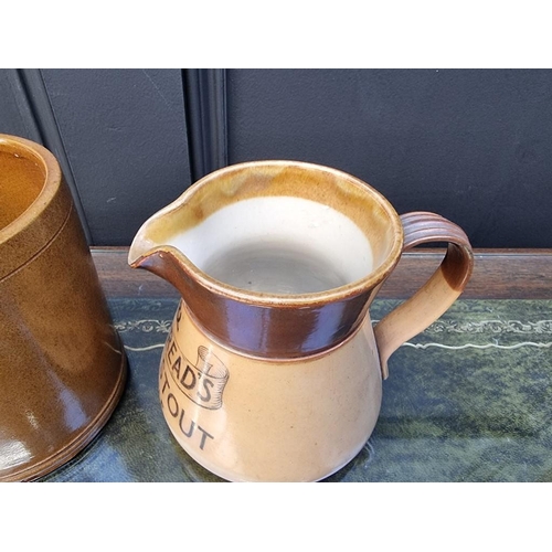 1486 - Advertising: a Royal Doulton 'Whitbread's' jug, 12cm high; together with a brown glazed frog mug. (2... 