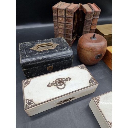 1489 - A small collection of boxes and caskets, to include a novelty book form example.