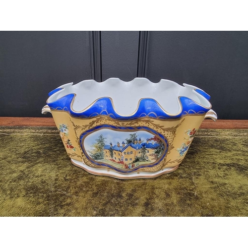 1499 - A Limoges twin handled cachepot, with painted decoration, 29.5cm wide.  