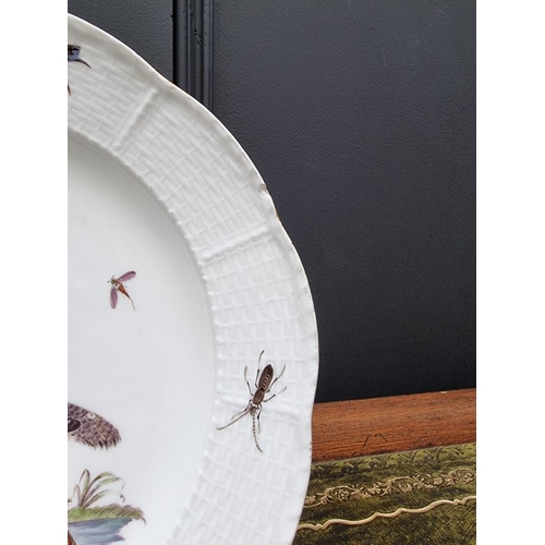 1500 - A 19th century Meissen plate, painted with a wading bird and insects, with basketweave boarder, 24.5... 