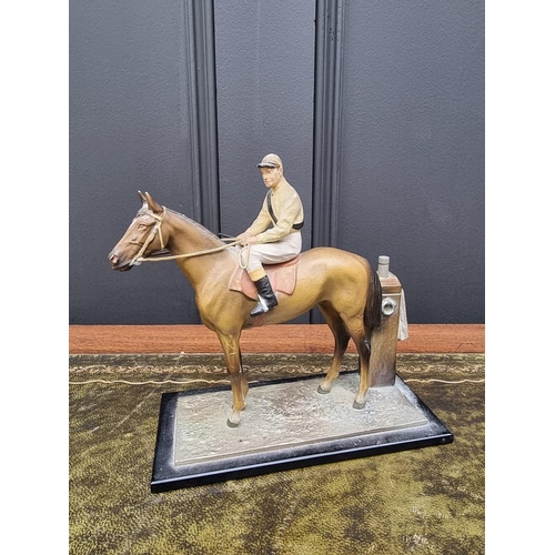 1503 - A novelty cold painted spelter horse and jockey table lighter, 17cm high. ... 