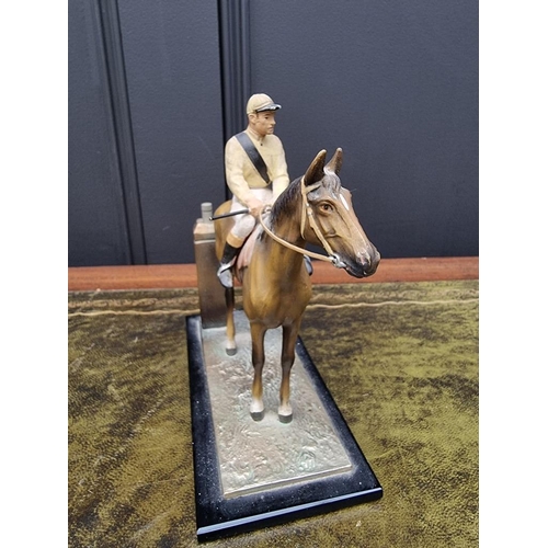 1503 - A novelty cold painted spelter horse and jockey table lighter, 17cm high. ... 