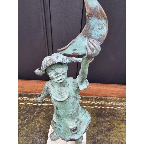 1506 - WITHDRAWN FROM SALE: a verdigris bronze figure of a young girl with crescent moon, indistinctly mark... 