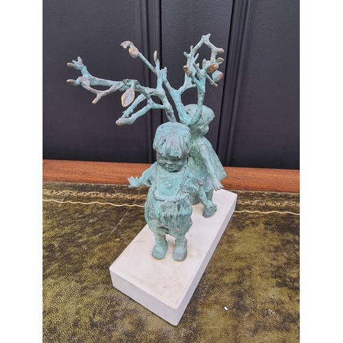 1507 - WITHDRAWN FROM SALE: a verdigris bronze figure group of two children under a fruit tree, 21cm high.... 