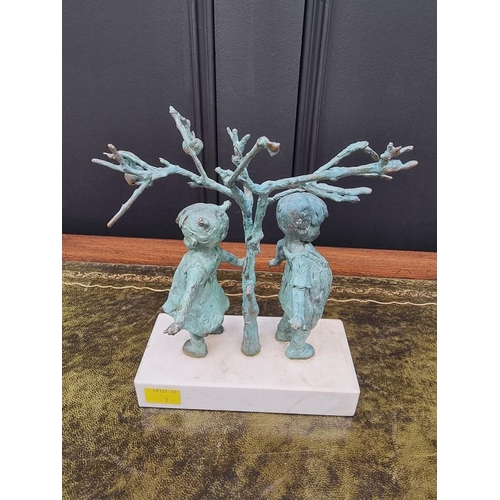 1507 - WITHDRAWN FROM SALE: a verdigris bronze figure group of two children under a fruit tree, 21cm high.... 