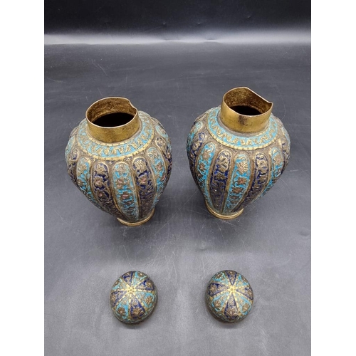 1521 - A pair of Kashmir enamel ovoid vases and covers, 19th century, 16cm high.