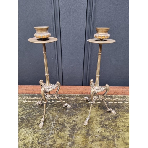 1533 - An interesting pair of late 19th century brass tripod candlesticks, height 26cm. ... 