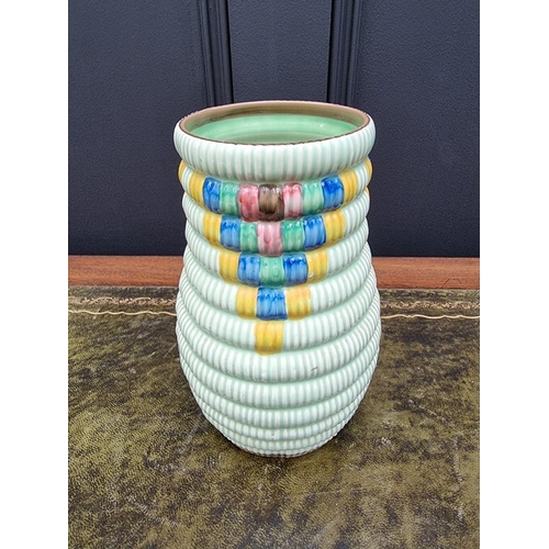 1534 - A Clarice Cliff vase, 20.5cm high. 