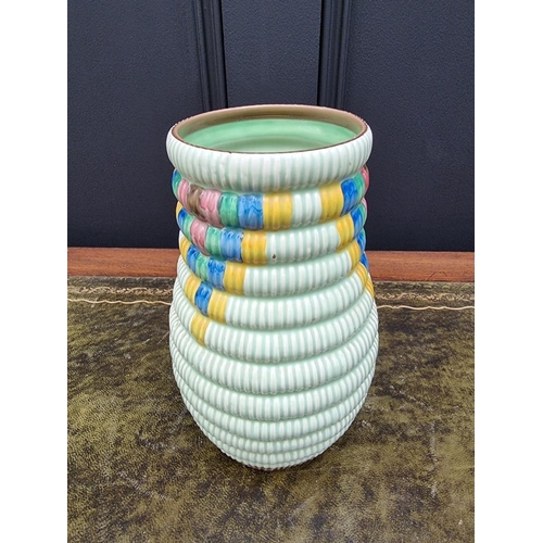 1534 - A Clarice Cliff vase, 20.5cm high. 