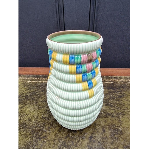 1534 - A Clarice Cliff vase, 20.5cm high. 