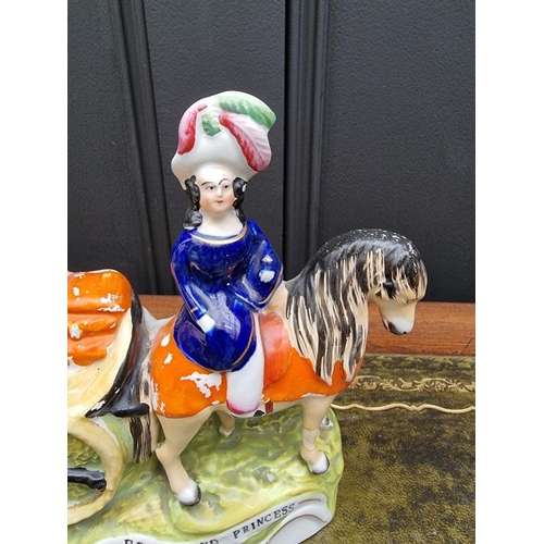 1535 - A rare Victorian Staffordshire pottery 'Prince and Princess' figure group, 19.5cm high. ... 