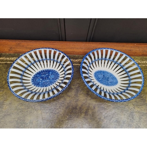 1539 - A pair of 19th century pearlware chestnut baskets, 22.5cm wide. 