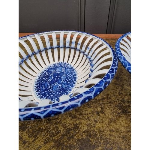 1539 - A pair of 19th century pearlware chestnut baskets, 22.5cm wide. 