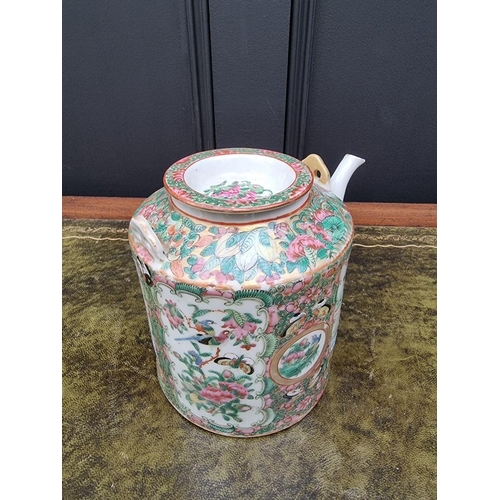 1548 - A Chinese famille rose wine pot and cover, 16cm high, (restoration).   