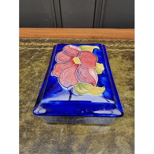 1553 - A Moorcroft rectangular box and cover, 12.5cm wide. 