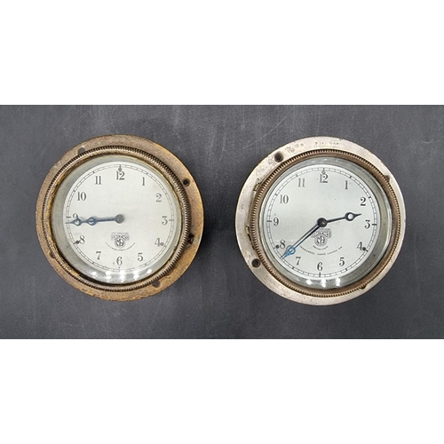 1561 - Automobilia: two vintage Smiths car dashboard timepieces, each 10.5cm diameter.... 