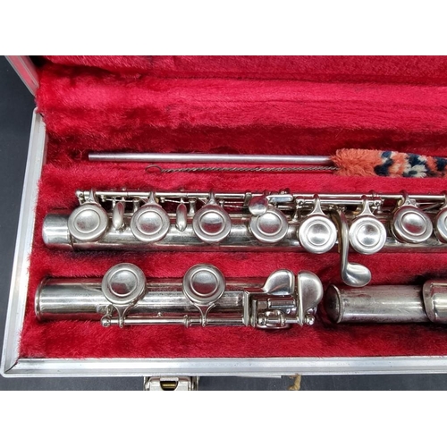 1565 - A Boosey & Hawkes 'Regent' chrome plated flute, in fitted case. 