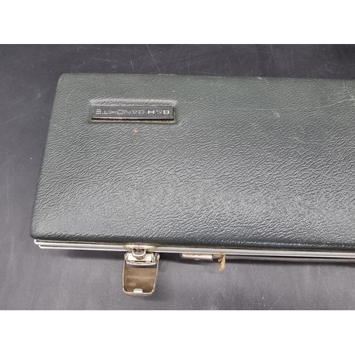 1565 - A Boosey & Hawkes 'Regent' chrome plated flute, in fitted case. 