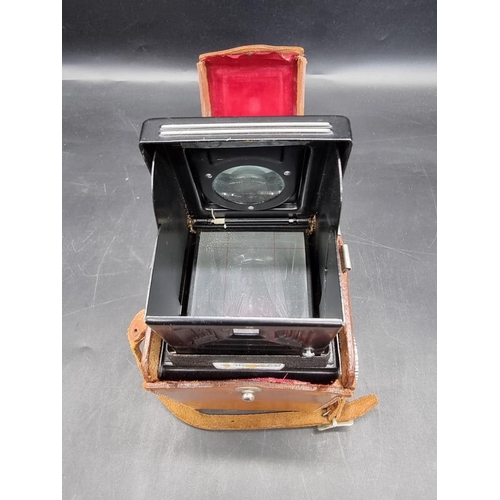 1578 - Cameras: a YashikaFlex, in leather case.  