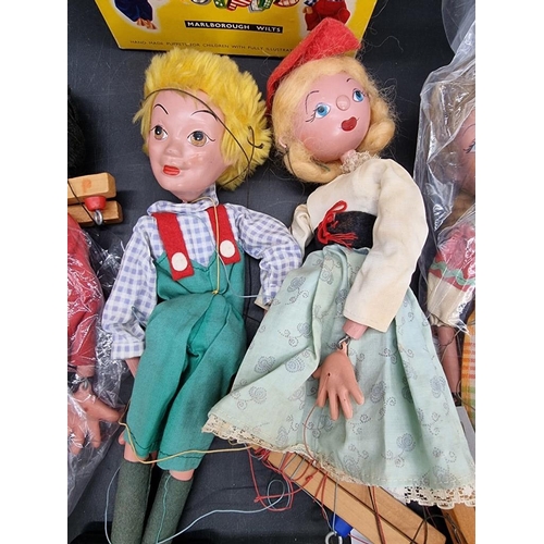 1586 - Six Pelham puppets, two boxed. 