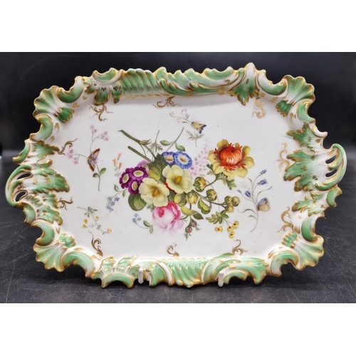 1600 - A 19th century porcelain dish or stand, possibly Rockingham, painted with flowers and butterflies, 3... 