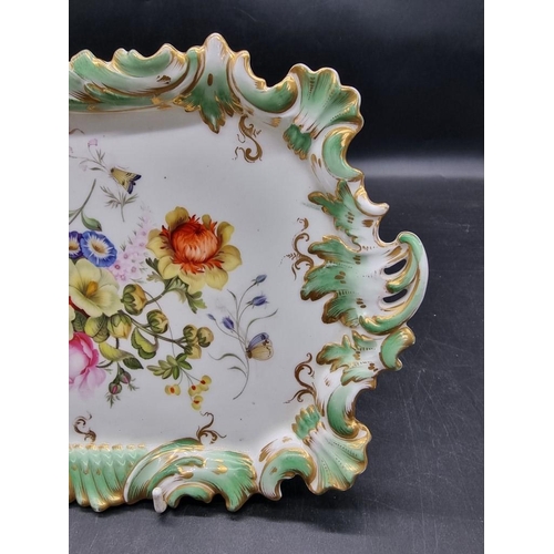 1600 - A 19th century porcelain dish or stand, possibly Rockingham, painted with flowers and butterflies, 3... 