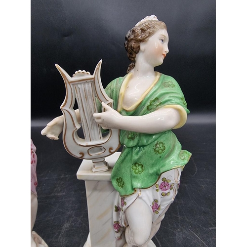 1601 - A pair of Continental porcelain figures, emblematic of the muses, 20.5cm high.