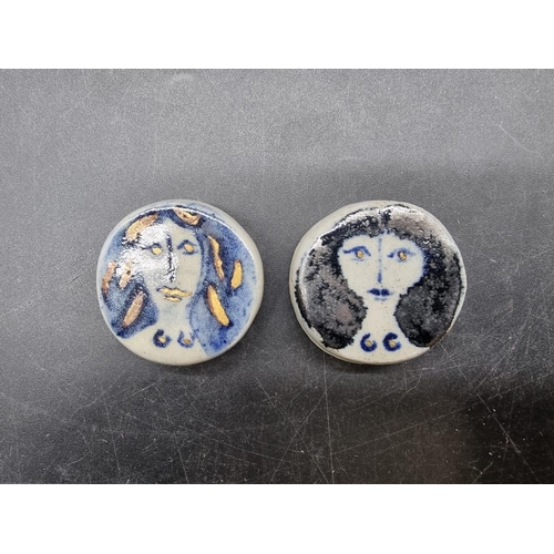 1609 - Studio Pottery: two small Eric James Mellon portrait roundels, 3.7cm diameter.