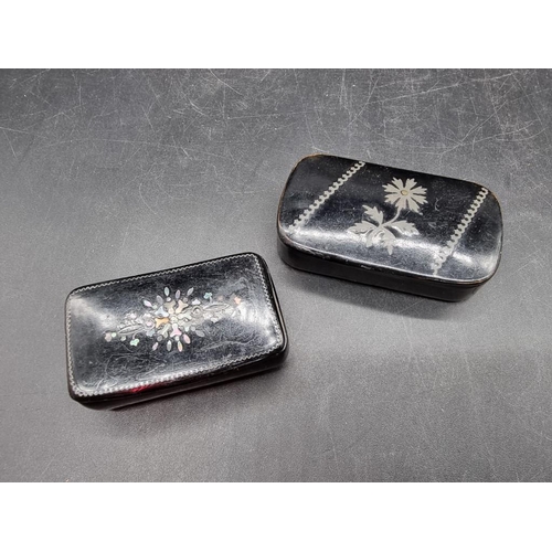 1632 - Two Victorian papier-mache snuff boxes, largest 7cm wide.