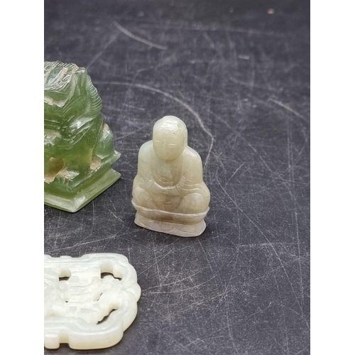 1663 - A small collection of Chinese jade and soapstone; together with a metal Buddha. (7)