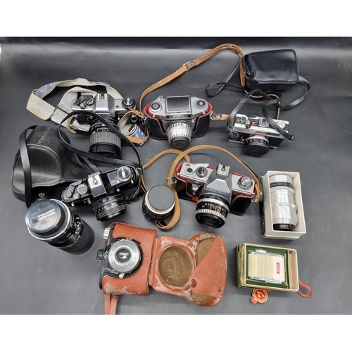 1687 - Cameras: a collection of Praktica 35mm cameras and other vintage cameras, lenses, tripods, etc.... 