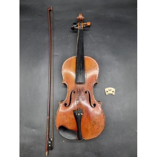 1691 - An interesting antique continental violin, with 14in two piece back, with bow and case. ... 