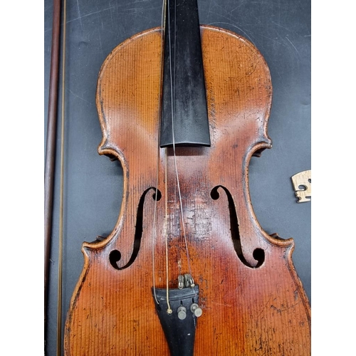 1691 - An interesting antique continental violin, with 14in two piece back, with bow and case. ... 