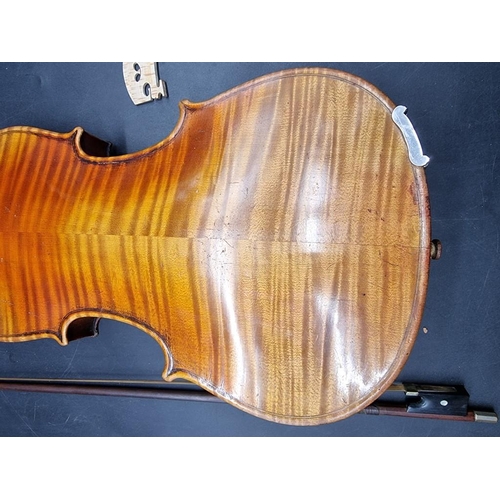 1691 - An interesting antique continental violin, with 14in two piece back, with bow and case. ... 