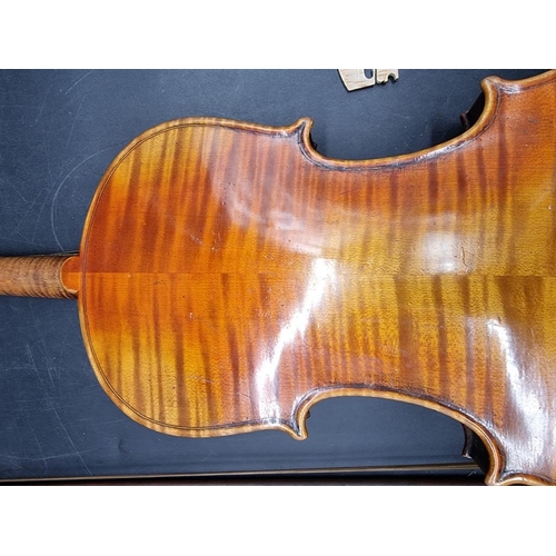 1691 - An interesting antique continental violin, with 14in two piece back, with bow and case. ... 