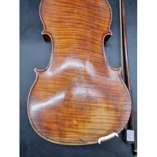 1692 - An antique continental violin, with 14in one piece back, (s.d); together with a bow and case.&n... 