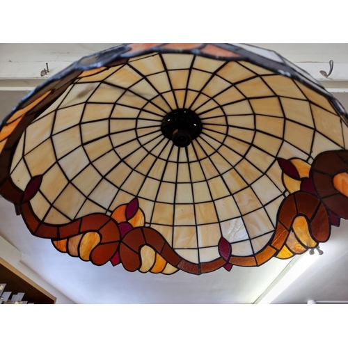 1697 - A leaded and stained glass ceiling light, from Christopher Wray, 51.5cm diameter.